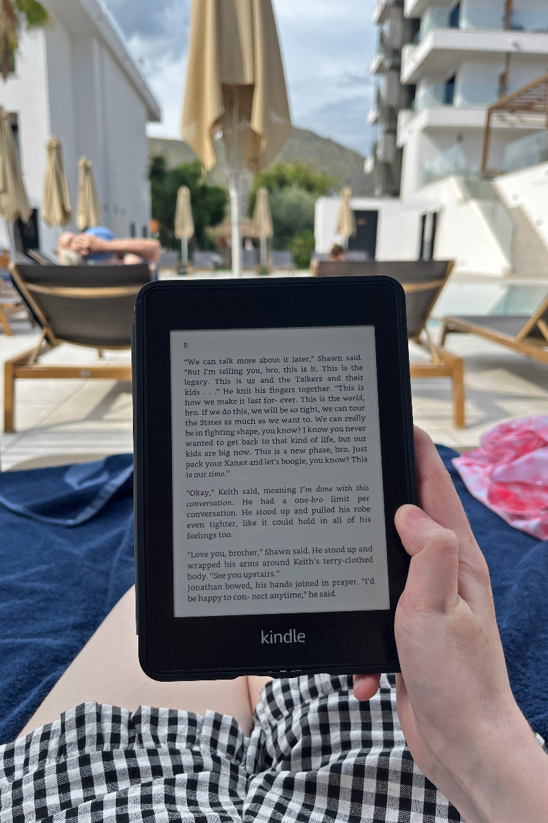 reading by the pool holiday